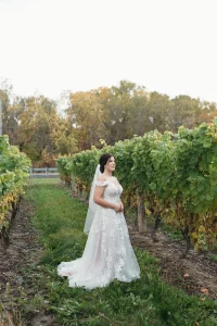 bride looking to the side doing little pea pose